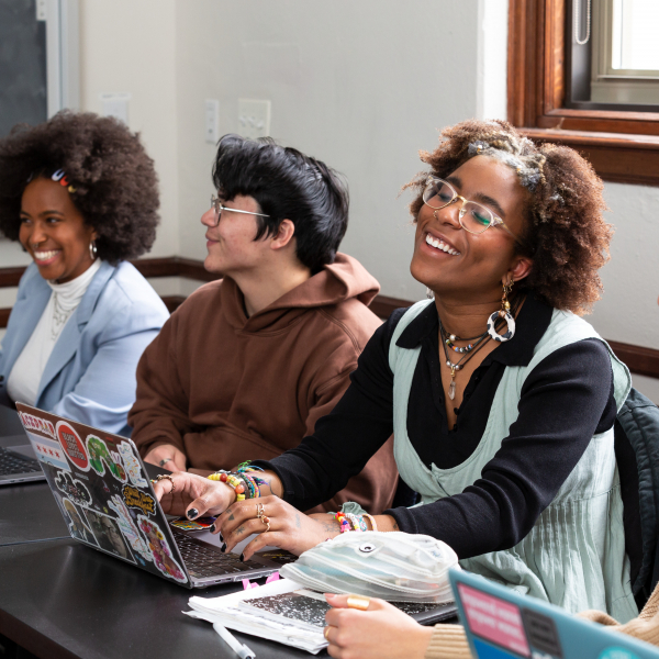 Washington University students at a table. 