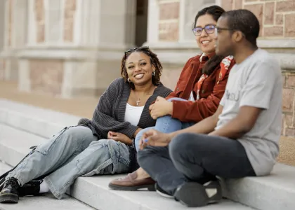 students sitting on stairs